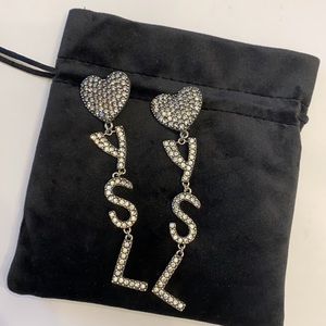 Saint Laurent -clip on earnings.